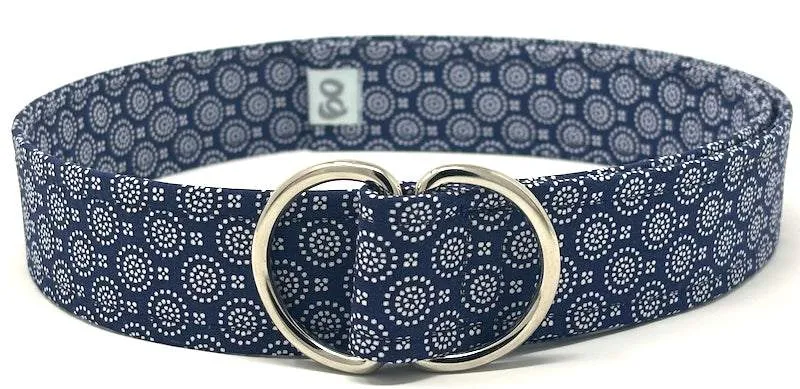 Navy d-ring belt with white circular detail by Oliver Green